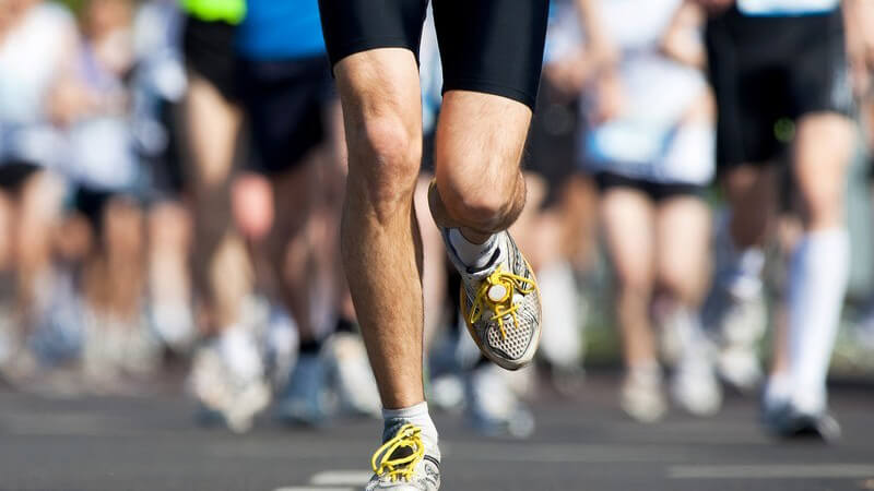 Beine eines Marathon-Läufers