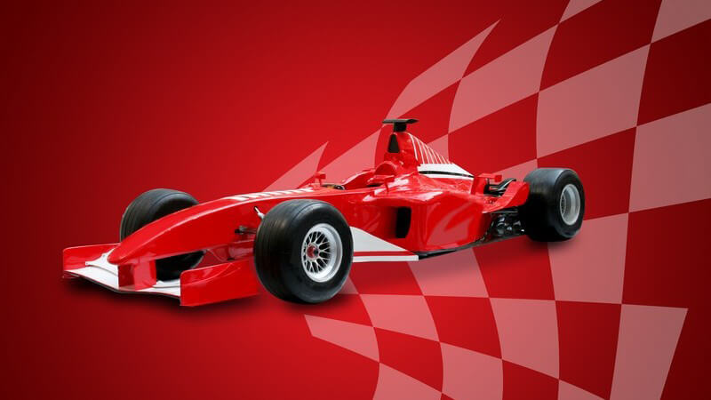 Formel 1 Rennauto auf rotem Hintergrund