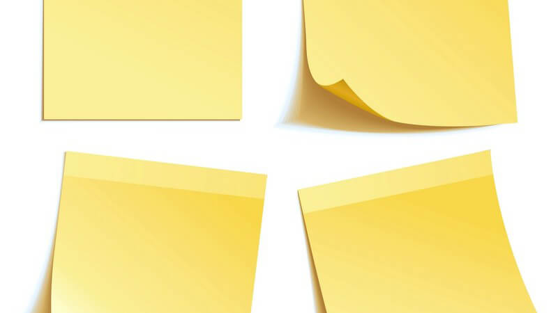 Grafik: Vier gelbe Haftnotizen/Klebezettel auf weißem Hintergrund
