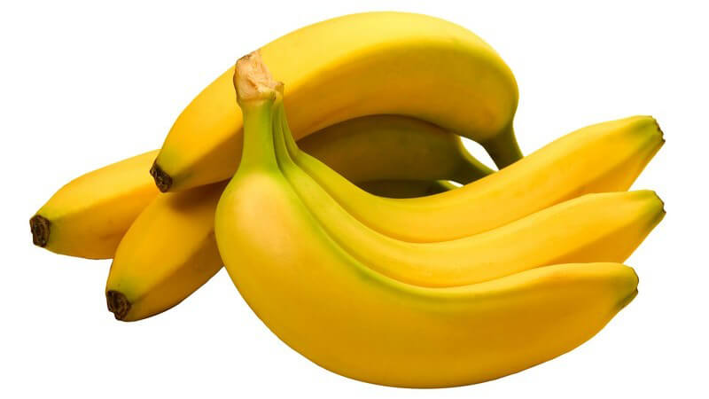 Frische Bananen auf weißem Hintergrund